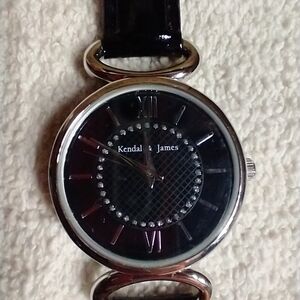 Women's silvertone Kendall and James black dress watch works has battery